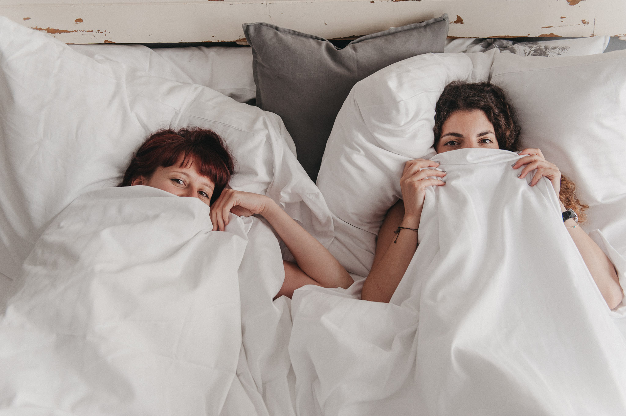women in a bed